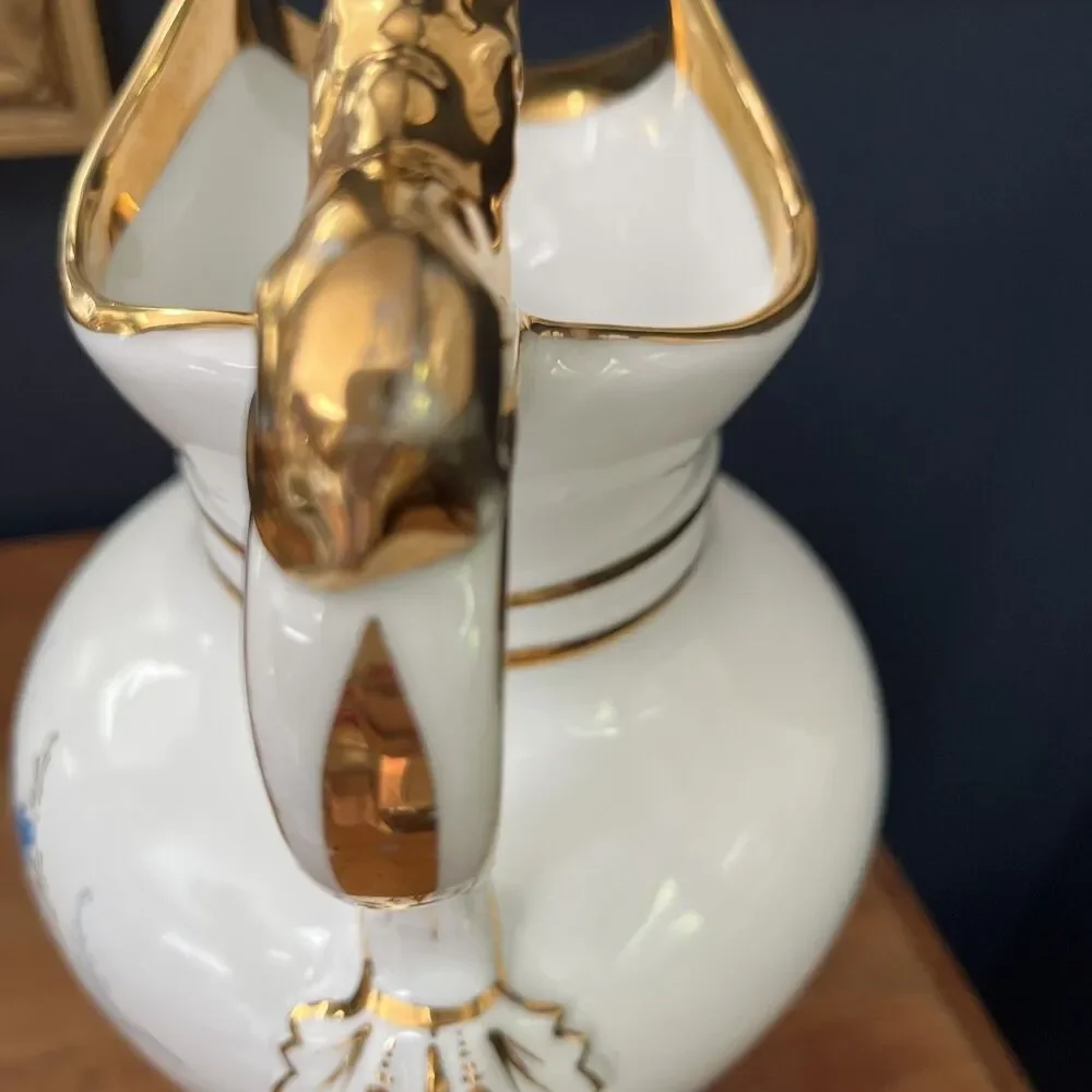 Antique Bing & Grøndahl chocolate jug in porcelain with gold lion handle w/lid